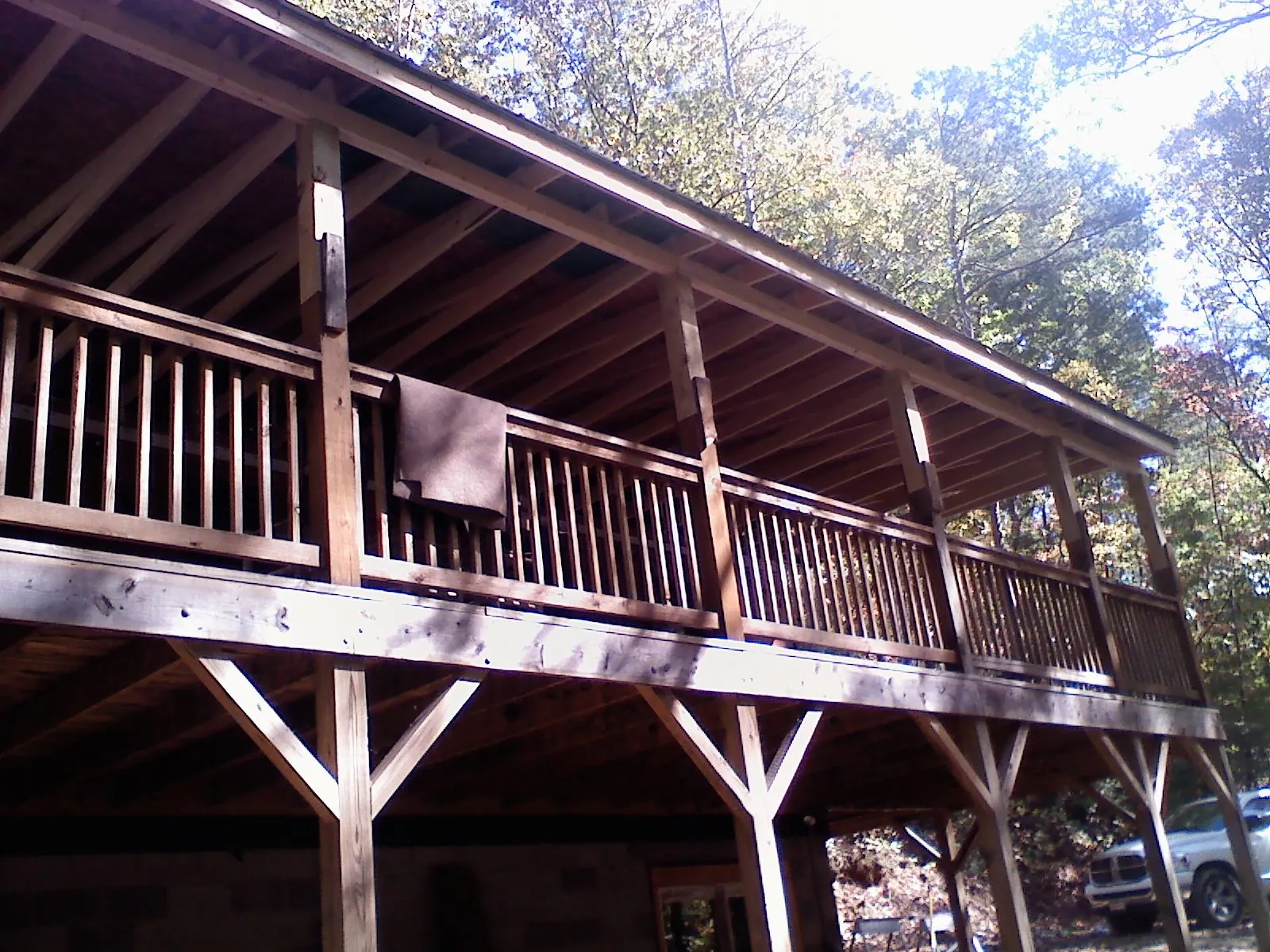 Timber framing under a new elevated porch and deck — Roof Leak Repair in Currituck by Roofing Brothers
